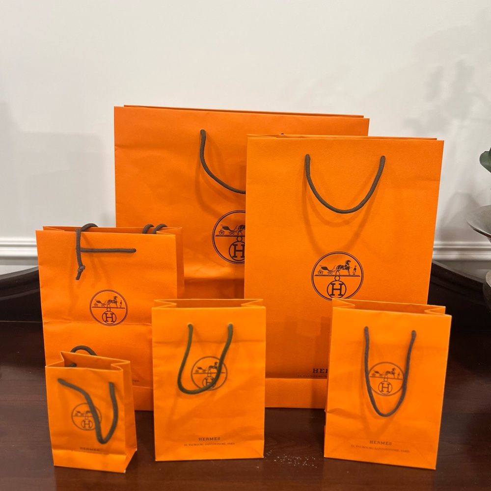 Hermès Orange Shopping Bags. Set of 6